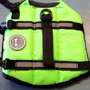 Small dog life jacket. Green. Good used condition. Adjustable.
